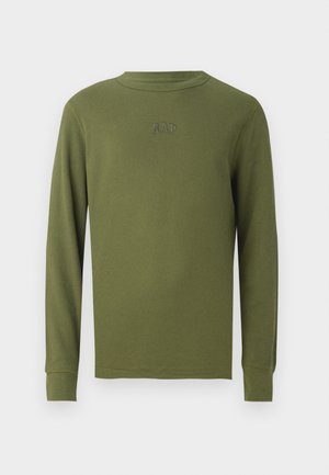 Olive green long-sleeve waffle knit shirt with crew neck and small embroidered GAP logo centered on the chest.