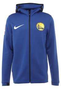 Sweat à capuche zippé bleu avec le logo des Golden State Warriors sur la poitrine, le swoosh Nike blanc et le logo NBA sur la manche.