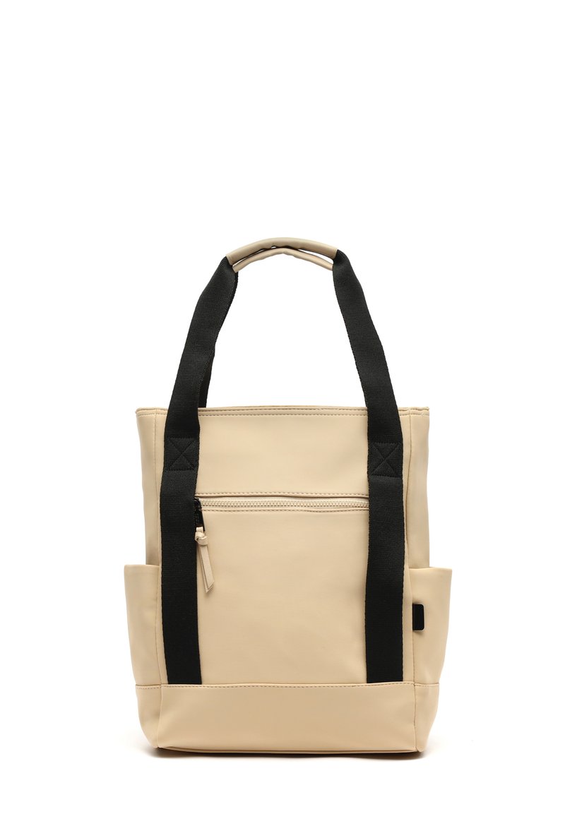 Borsa tote beige con manici neri, dotata di una tasca frontale con zip, tasche laterali e un design strutturato con una texture liscia.