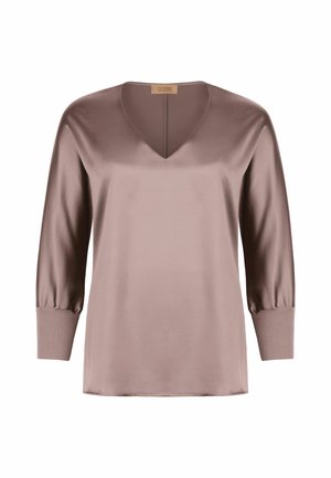 Satinblus i mauve med V-ringning, trekvartsärmar och åtsittande manschetter. Mjuk textur och avslappnad passform.