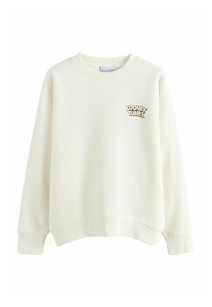 Krémfehér pulóver hosszú ujjakkal, bordázott mandzsettákkal és szegéllyel, bal mellkason kis barna "Looney Tunes" feliratos logóval.