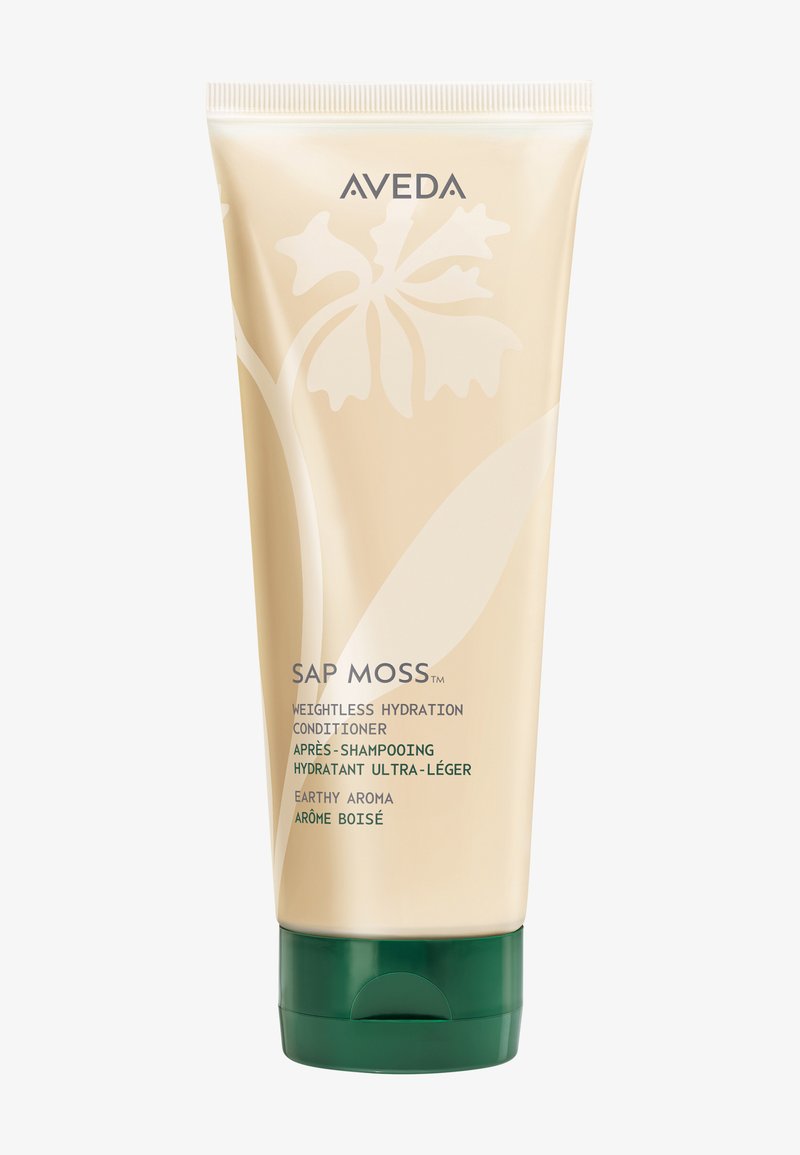 Tubito acondicionador hidratante sin peso Aveda Sap Moss con cuerpo beige, diseño floral y tapa abatible verde oscuro.