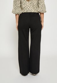 Minus MSMARCIA WIDE LEG  - Auduma bikses - black