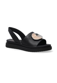 Schwarze Leder-Slingback-Sandalen mit einer abgerundeten Spitze, die eine große metallische Akzent auf dem Obermaterial und eine strukturierte schwarze Sohle aufweisen.