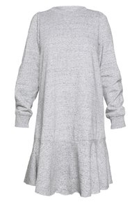 Robe grise à manches longues en tissu doux et texturé. Encolure ronde, coupe décontractée, avec une base évasée. Motif léger à pois sur l'ensemble.