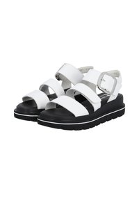 White sandal with multiple straps and a silver buckle, featuring a cushioned black sole with a textured tread for grip.