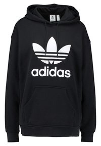 Svart hoodie i bomull med stor vit Adidas-logotyp och tre horisontella ränder på bröstet; kenguruficka och huva med dragsko.