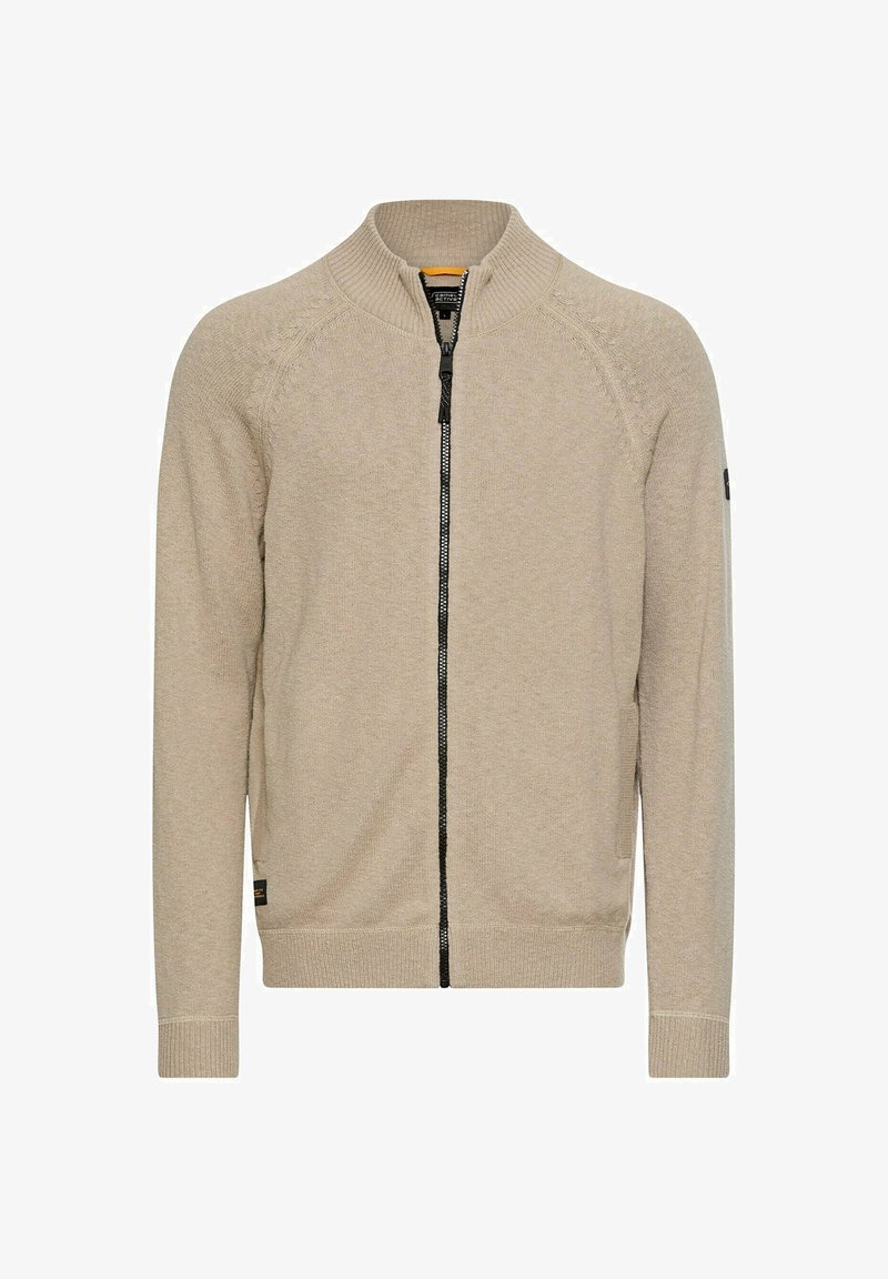 Lysebeige cardigan med lynlås i strikket stof, der har en ribbet krave, sort lynlås og sidelommer. Enkel design uden mønstre.