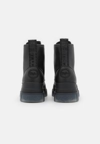 Buffalo ASPHA - Botas de tornozelo com plataforma - black/transparent