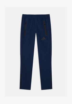 adidas Performance, TIRO TRAVEL UNISEX - Pantalons outdoor - team navy blue/black