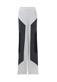 Witte wijde pijpen met donkergrijze en zwarte geometrische zijpanelen, voorzien van een elastische tailleband en een zachte stoftextuur.