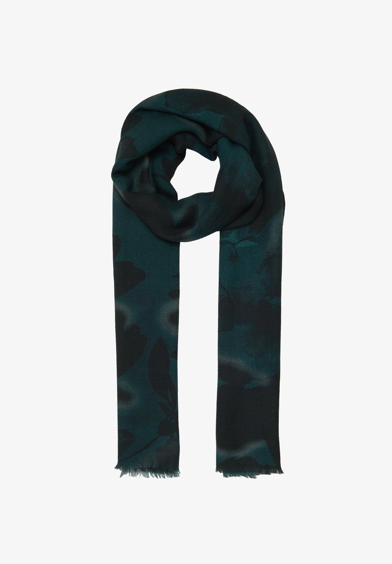Bufanda verde oscuro con un patrón floral en tonos de negro. Fabricada con una tela suave y con extremos con flecos, se drapea de manera laxa.