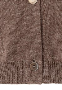 Brown knitted cardigan featuring a textured fabric, ribbed cuffs, and two round metal buttons with logo detail.