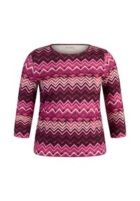 Langarmshirt mit Zickzackmuster in Rosatönen, Weiß und Schwarz. Hergestellt aus strukturierter Stoff mit rundem Ausschnitt.