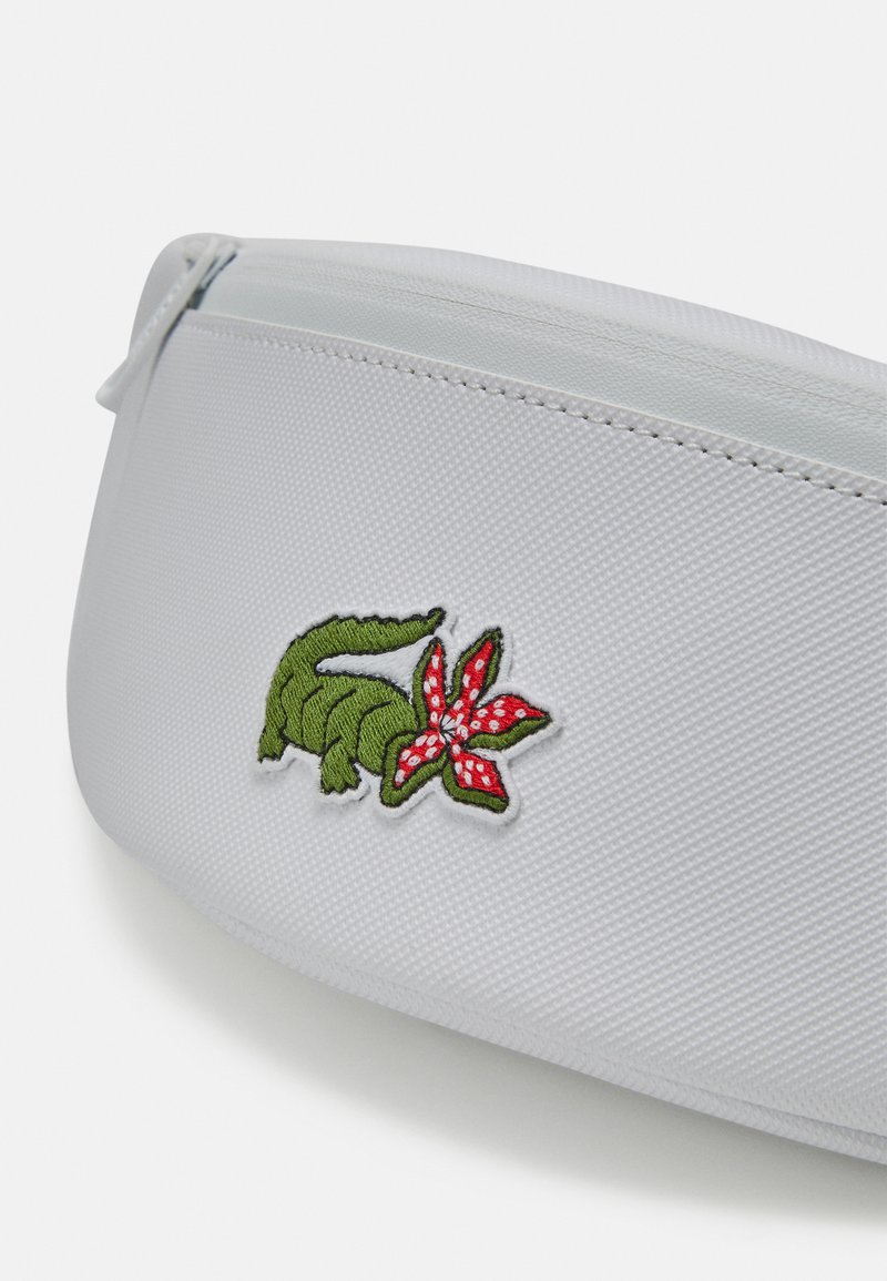 Lacoste LACOSTE X NETFLIX UNISEX - Bum bag - croco stranger things 