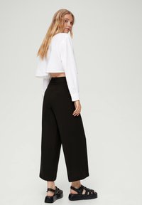 QS CULOTTE  - Broek - schwarz