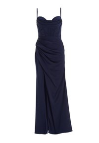 Robe de soirée bleu marine avec un corsage ajusté, des détails plissés et une jupe drapée dotée d'une fente sur le côté et de fines bretelles ajustables.