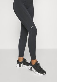 Under Armour TRAIN SEAMLESS - Tights - black/white