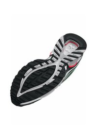 Suola di scarpe da corsa in bianco e nero, con suola in gomma testurizzata e scanalature per aderenza, accentuata da dettagli verdi e rossi.