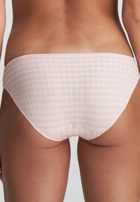 Pink checkered bikini bottom with a smooth texture, mid-rise cut, and a seamless waistband for a comfortable fit.