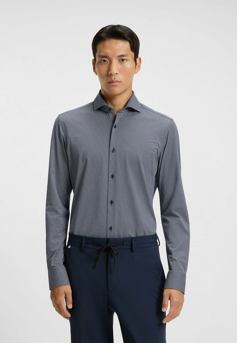 Lichtgewicht, langarm overhemd in marineblauw met een klein wit geometrisch patroon, met een button-down kraag en een knoopsluiting aan de voorkant.