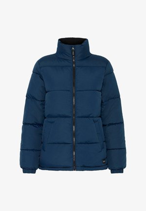 Marinblå puffjacka med hög krage, framdragkedja och två sidofickor. Har quiltade sektioner och elastiska ärmslut. Mjuk textur.