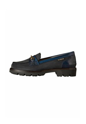 Black and navy leather men's loafer with gold buckle detail and thick black rubber sole.