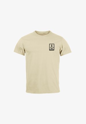 Beige cotton T-shirt with short sleeves, featuring a small black anchor logo and "NEVERLESS" text inside a rectangular border on the chest.