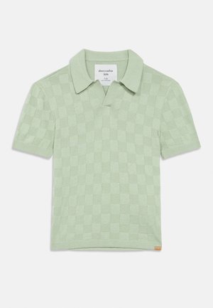 Heleroheline lühikeste varrukatega polo-särk, kudumiga ruudulise tekstuuriga ja kraega, suurus 7/8 lastele.