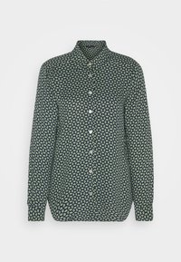 Chemise à manches longues boutonnée avec un fond noir et un petit motif floral blanc et jaune, avec un col montant et des poignets boutonnés.