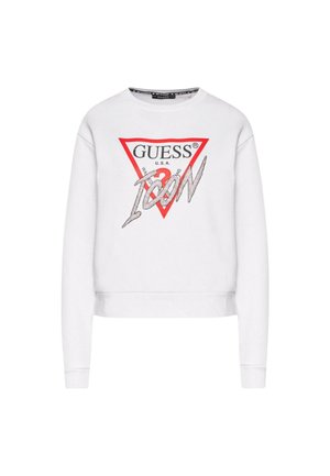 Felpa corta bianca in cotone con un logo triangolare rosso e la scritta "GUESS" e "ICON" in lettere nere e argento.