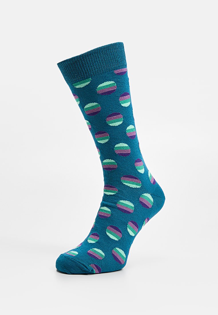 Turkusowe skarpetki z wzorem kolorowych kółek w odcieniach fioletu, turkusu i zieleni. Tekstura dziana z prążkowanym ściągaczem u góry.