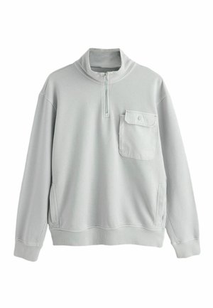 Lysegrå sweatshirt med opretstående krave, halvlange lynlås og forlommer. Har ribbet manchetter og kant med blødt, tekstureret stof.