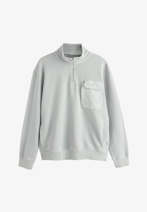Lysegrå sweatshirt med opretstående krave, halvlange lynlås og forlommer. Har ribbet manchetter og kant med blødt, tekstureret stof.