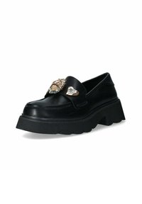 Pantofole in pelle nera con suola piatta spessa, caratterizzate da elementi decorativi in oro e gemme sul gambetto.