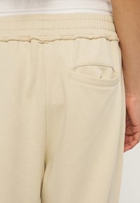 YOURTURN UNISEX - Παντελόνι φόρμας - beige