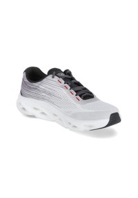 Athletic shoe with a white mesh upper, textured gray accents, black laces, and a white cushioned sole featuring cut-out sections for breathability.