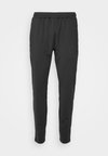 STRIDE WORKOUT PANTS - Verryttelyhousut - charcoal