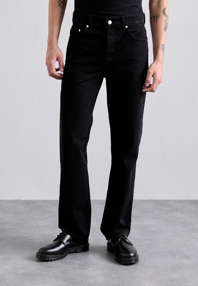 sandro STONEWASH - Relaxed fit jeans - noir