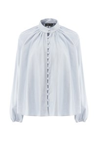 Blusa azzurro chiaro a maniche lunghe realizzata in tessuto morbido. Presenta un collo alto, spalle arricciate e bottoni rotondi decorativi lungo la parte anteriore.