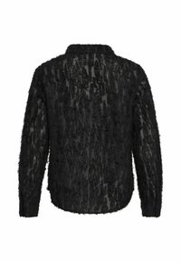 Melnas, garām piedurknēm krekls ar pūkainu tekstūru, piedāvā brīvu piegriezumu un apkakli. Audums ir caurspīdīgs ar slāņu dizainu.