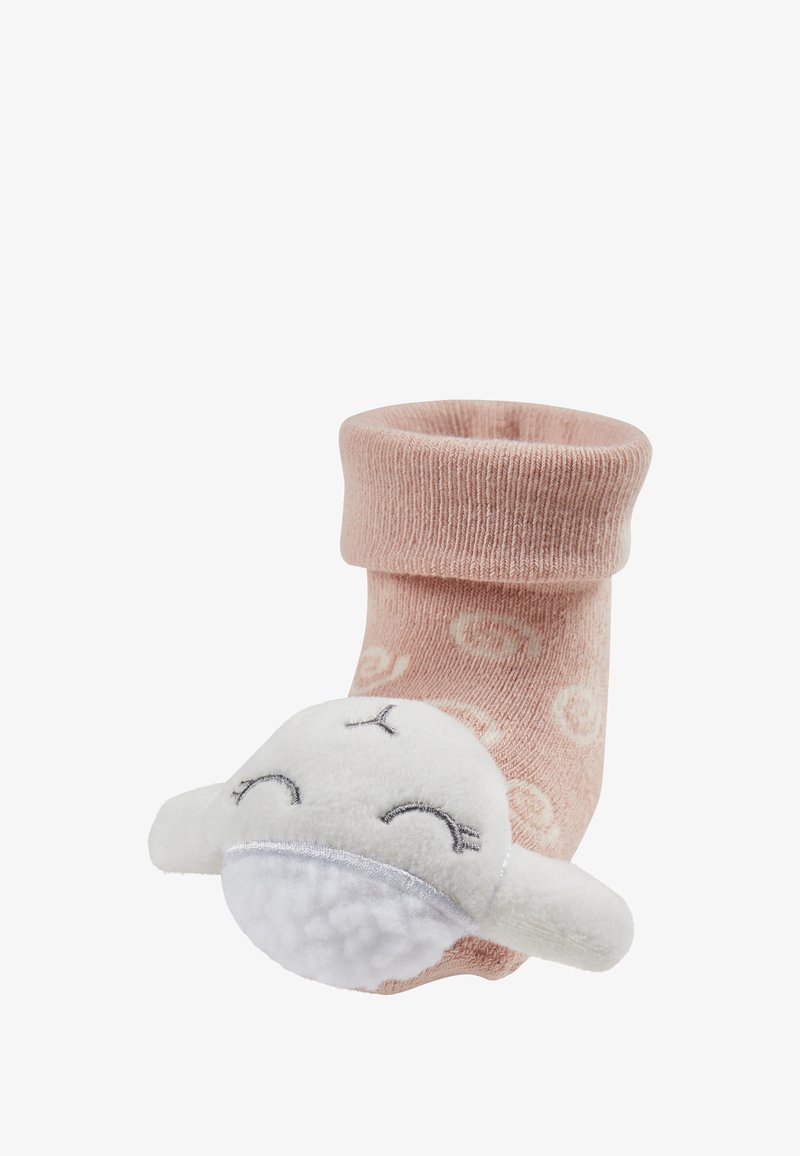 Pink sock with a rolled cuff, featuring a white plush animal with stitched facial details. Made from soft fabric with a textured finish.