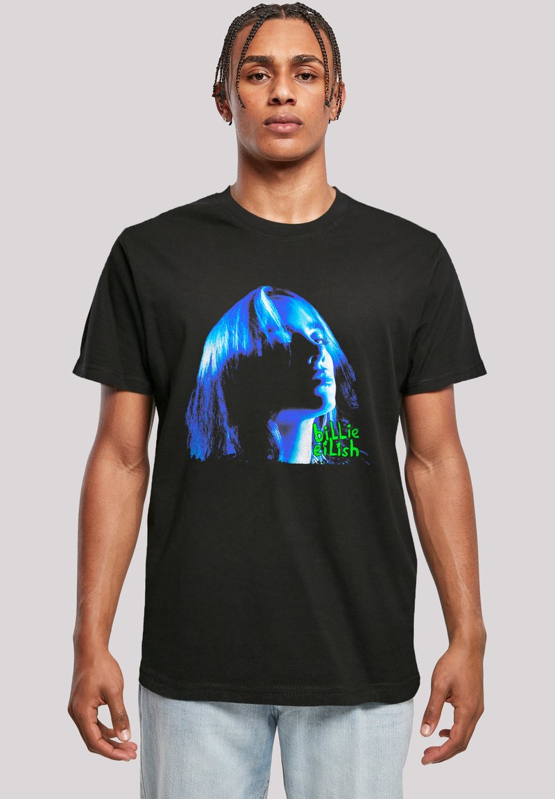 Black cotton t-shirt featuring a graphic print of a woman's face in blue and green, with text reading "billie eLlish" at the bottom.