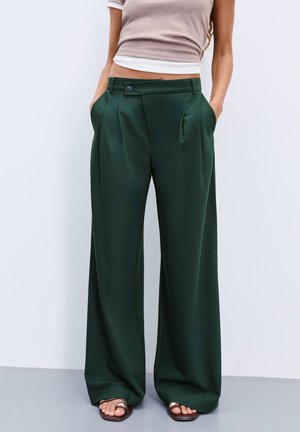 WITH CROSSOVER WAIST - Pantalon classique - dark green