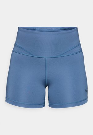 Blue athletic shorts made of stretchy material, featuring a high waistband, flatlock seams, and a subtle logo on the left side.
