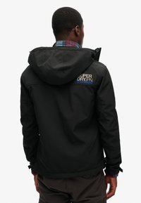Superdry & Co TREKKER - Chaqueta outdoor - black