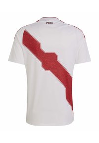 Witte sporttrui met een gedurfde rode diagonale streep en ingewikkelde patronen, ronde halslijn en "PERÚ" op de achterkant gedrukt.