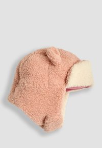 Roze fleece muts met oorkleppen, met een zachte textuur, een comfortabele pasvorm en kleine oortjes bovenop. Binnenzijde gevoerd met een crèmekleurige stof.