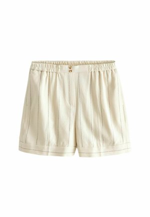 Beige elastiske shorts med lodrette sorte syningslinjer, frontknaplukning og opsmøgede kanter.