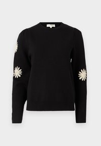 Svart genser med rund hals, lange ermer og broderte hvite tusenfryd på ermene. Mykt, teksturert stoff.